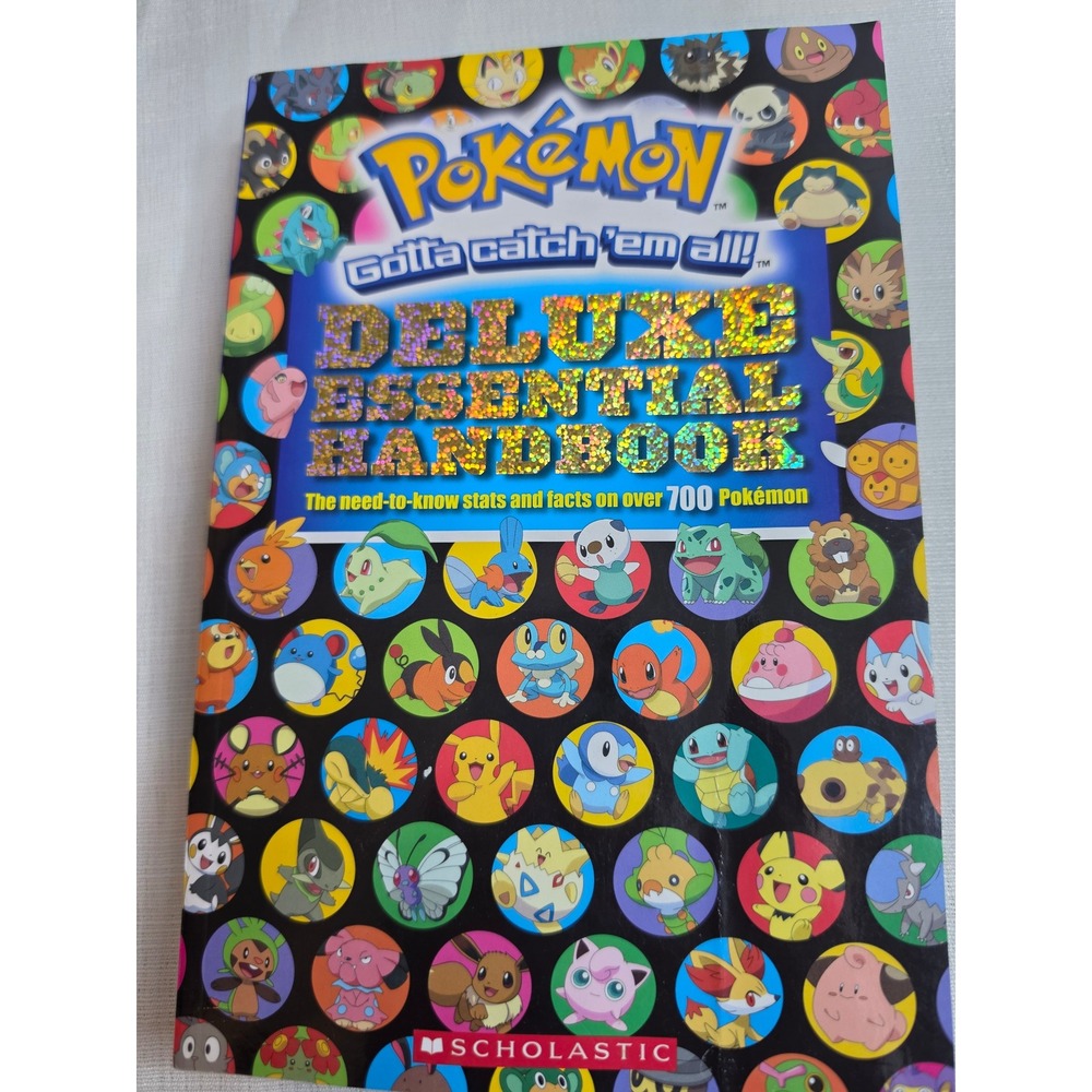 Pokemon Deluxe Essential Handbook Over 700 Pokemon Scholastic Guide Book